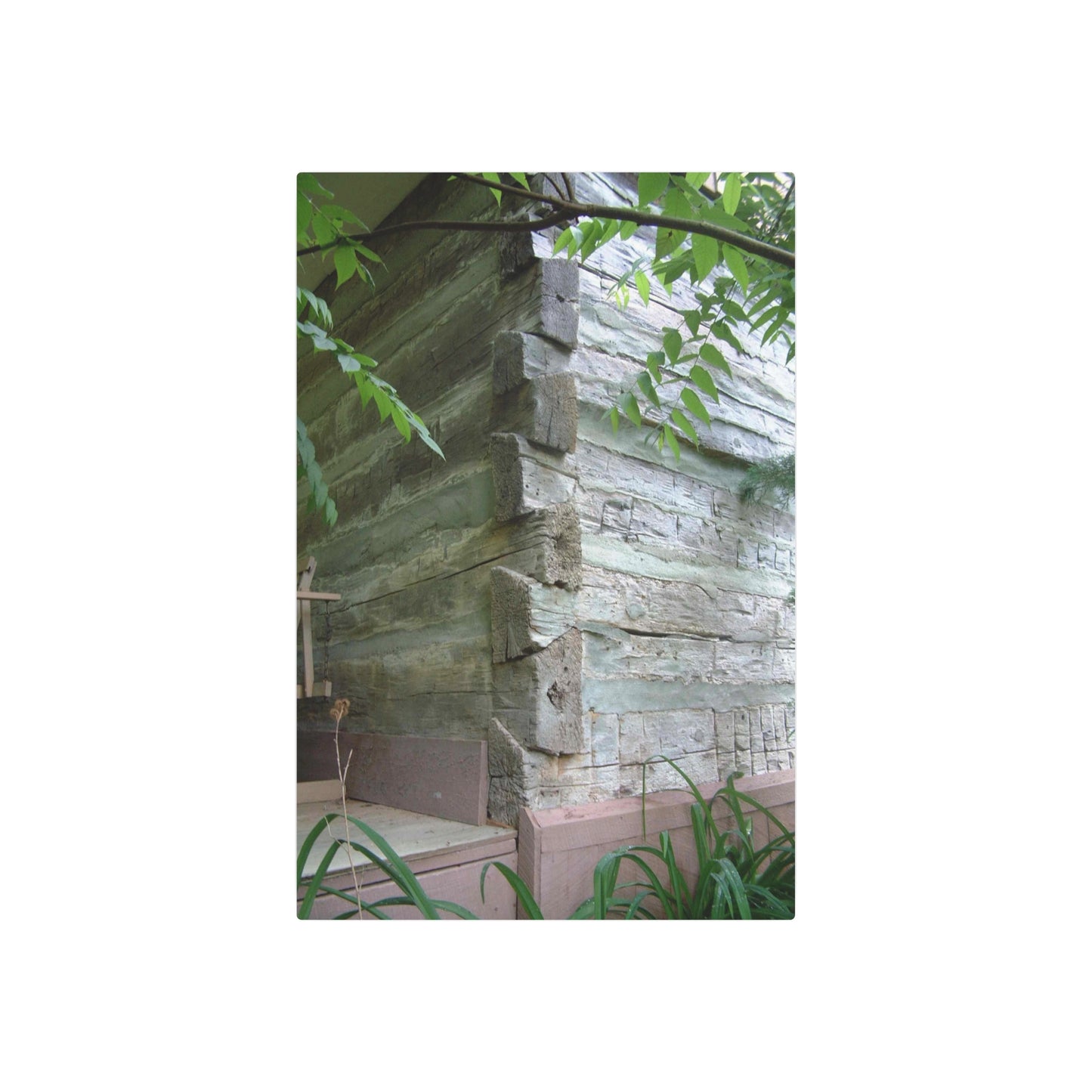 Metal Art Sign Showing Aged Log Home Walls